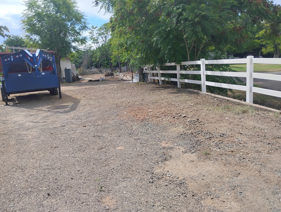 Completed white fence installation project